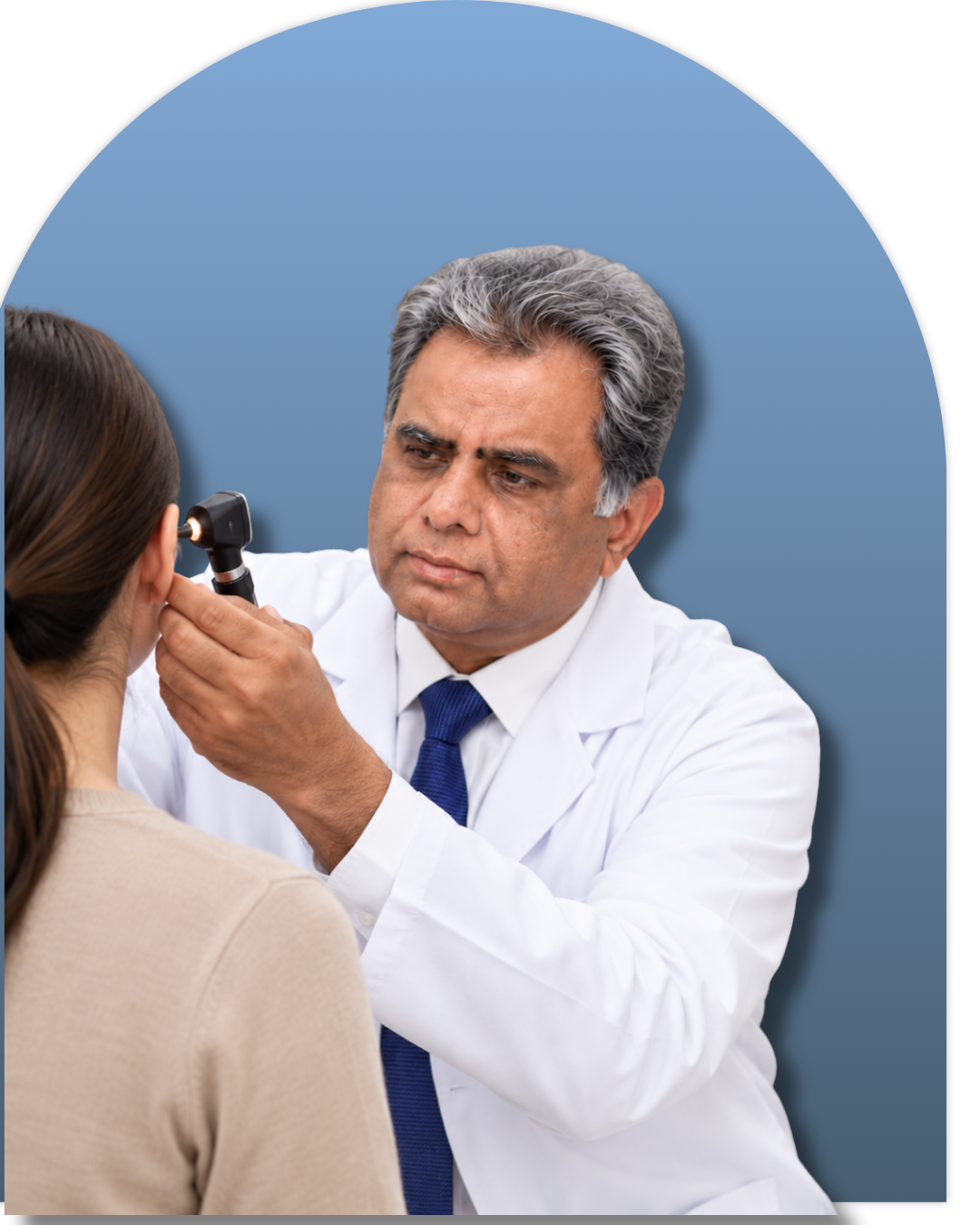 Dr. Brig. M. Shahzad Hanif Mehr examining an ENT patient